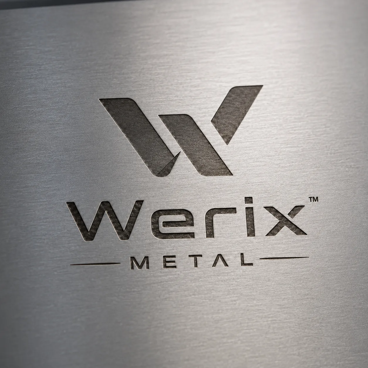 Laser engraved Werix logo on metal — fiber laser marking with permanent contrast